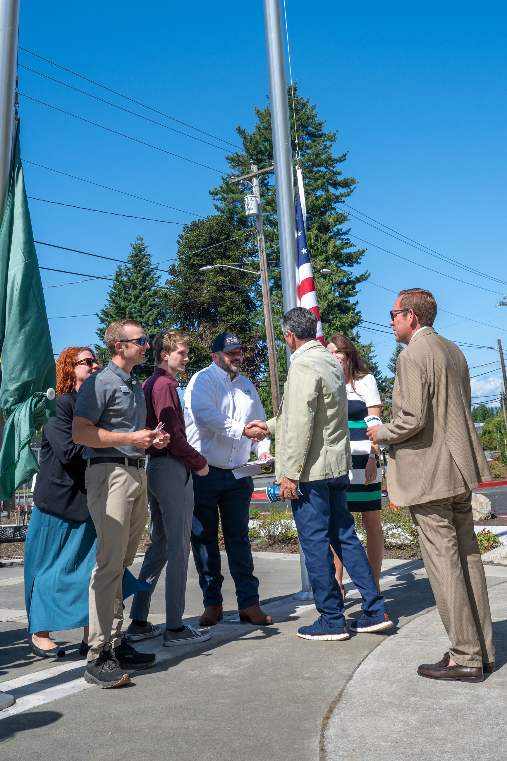 1MayorHandShakeGoehner Steele-Flag